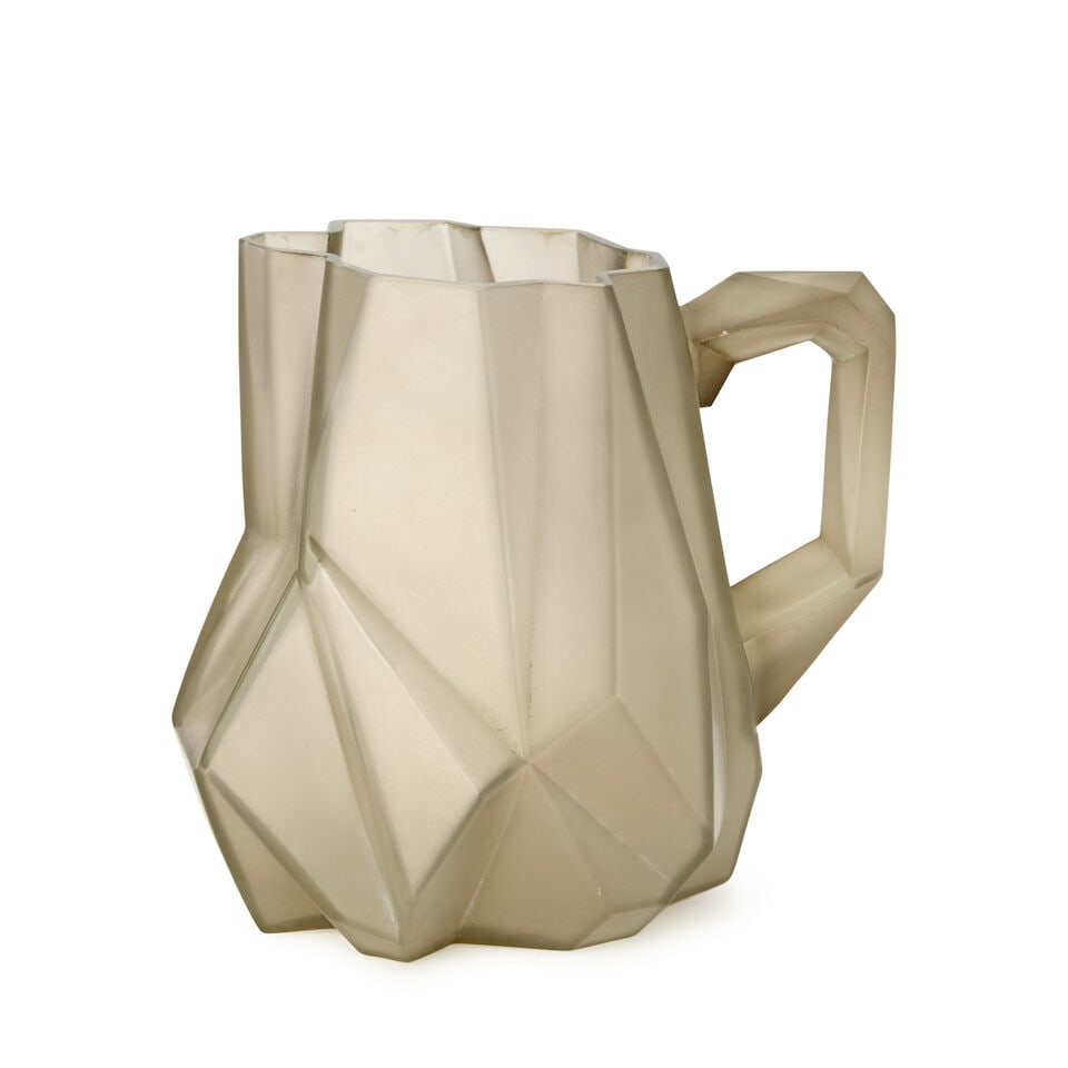 REUBEN HALEY (1872-1933) FOR CONSOLIDATED LAMP AND GLASS CO. 'RUBA ROMBIC' JUG Coraopolis, Penns...: REUBEN HALEY (1872-1933) FOR CONSOLIDATED LAMP AND GLASS CO. 'RUBA ROMBIC' JUG Coraopolis, Pennsylvania, circa 1930, mold-blown silver glass, unmarked, ht. 8 in. Footnotes: Literature For the form see