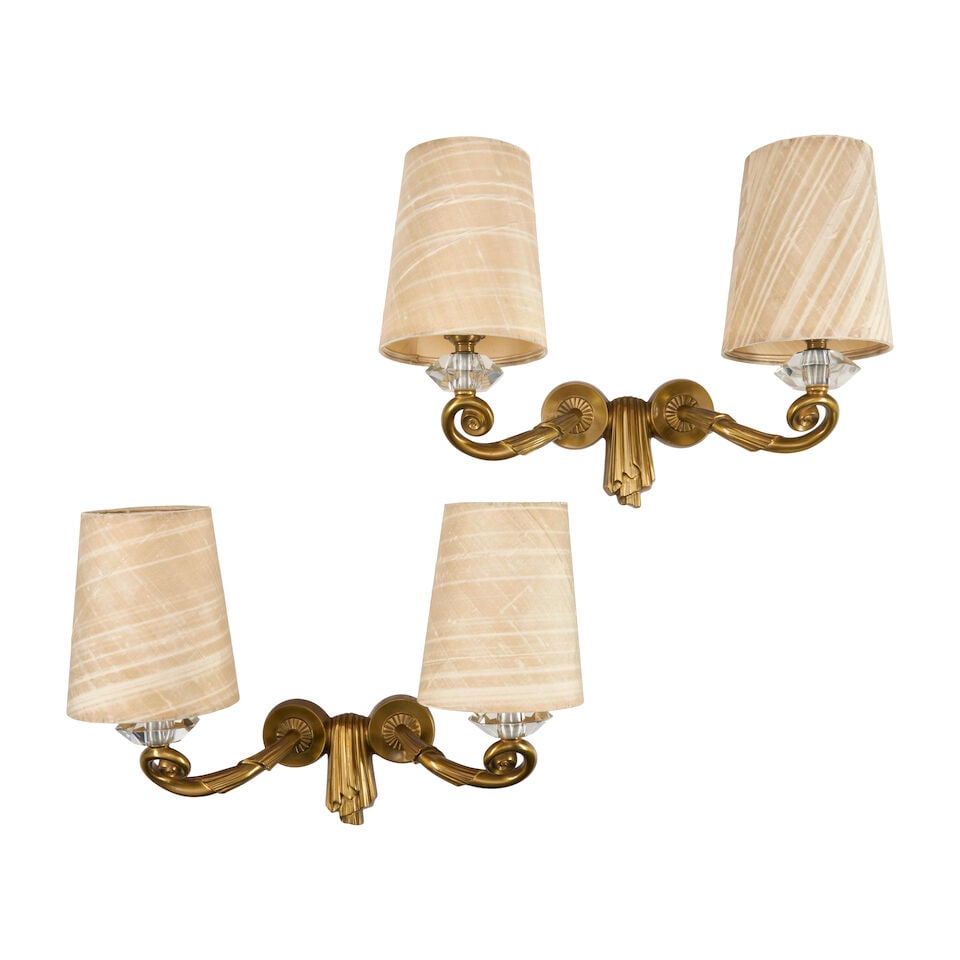 PAIR OF JULES LELEU (1883-1961) ART DECO TWO-ARM SCONCES France, circa 1940, gilt bronze, glass,... (1 of 3)