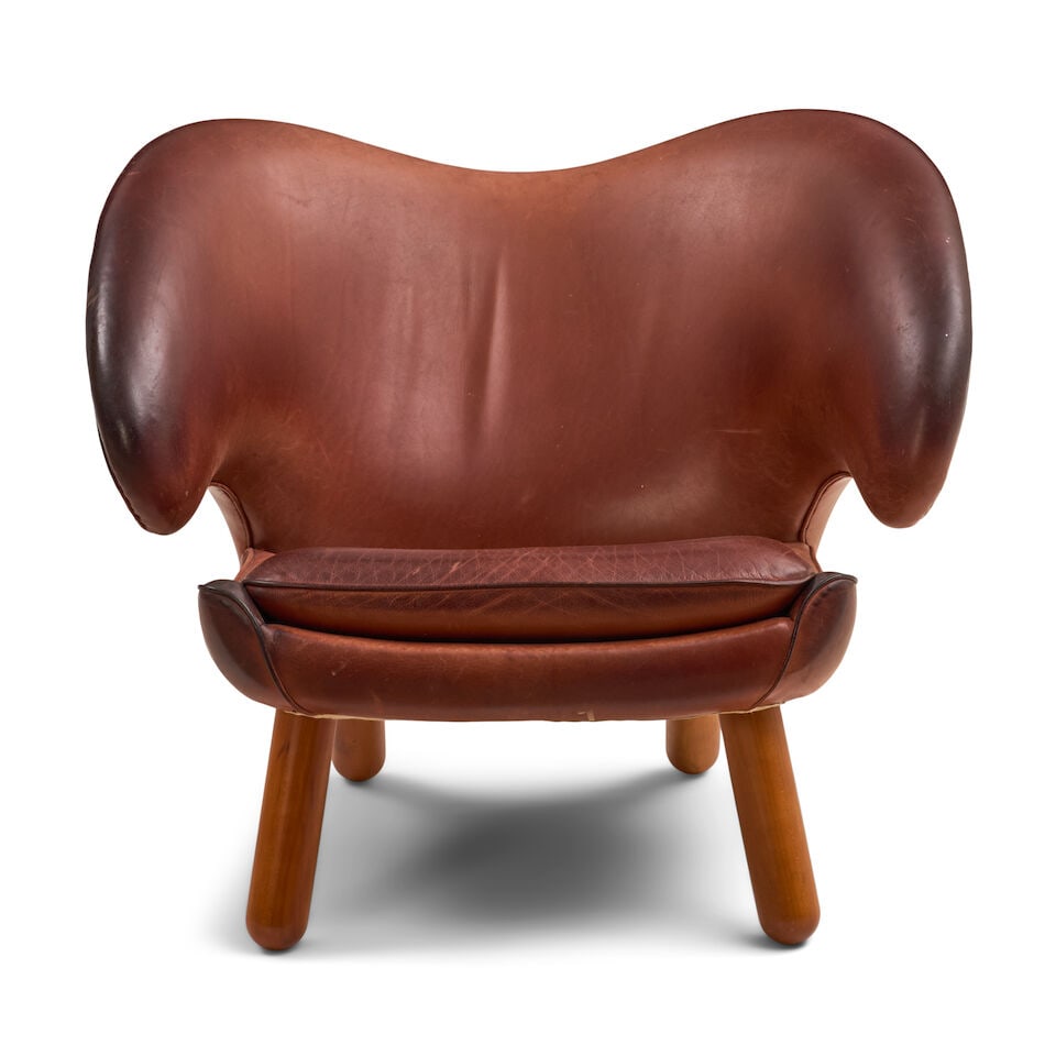 'PELICAN' CHAIR AFTER FINN JUHL probably Denmark, circa 2000, leather upholstery, wood legs, unm... (1 of 3)