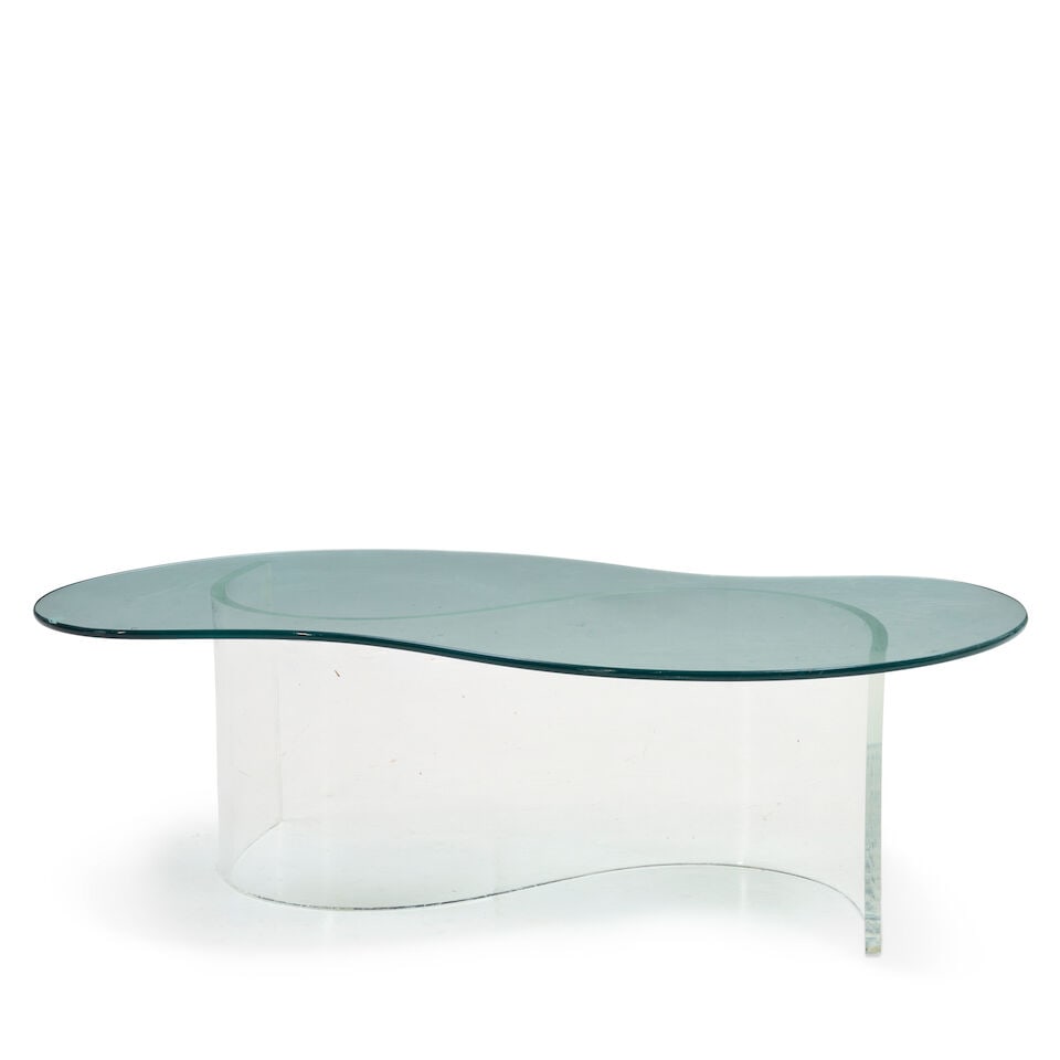 BIOMORPHIC COFFEE TABLE IN THE MANNER OF VLADIMIR KAGAN United States, circa 1970, Lucite, glass... (1 of 2)