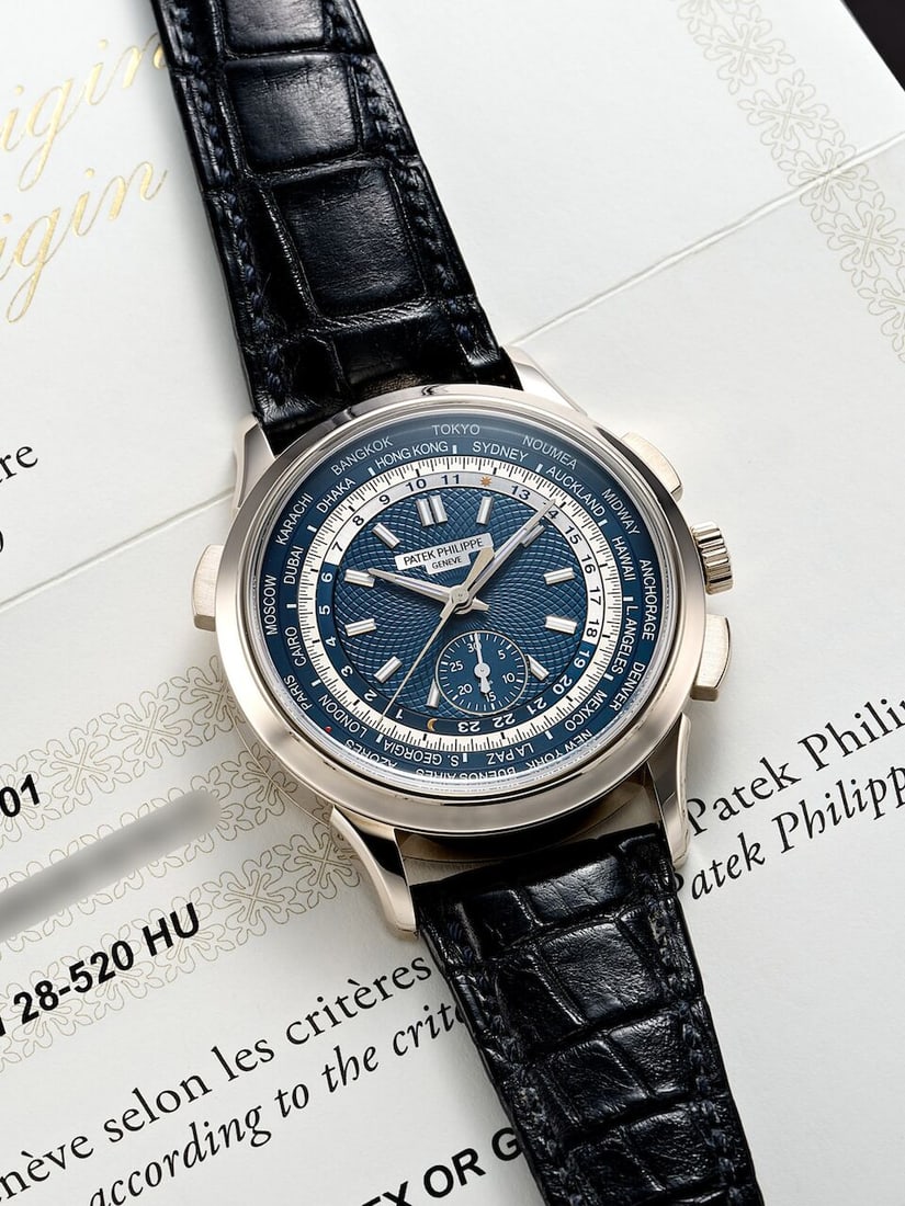 PATEK PHILIPPE | WORLD TIME, REF.5930G-001, A FINE WHITE GOLD WORLD TIME FLYBACK CHRONOGRAPH WRI... (1 of 5)