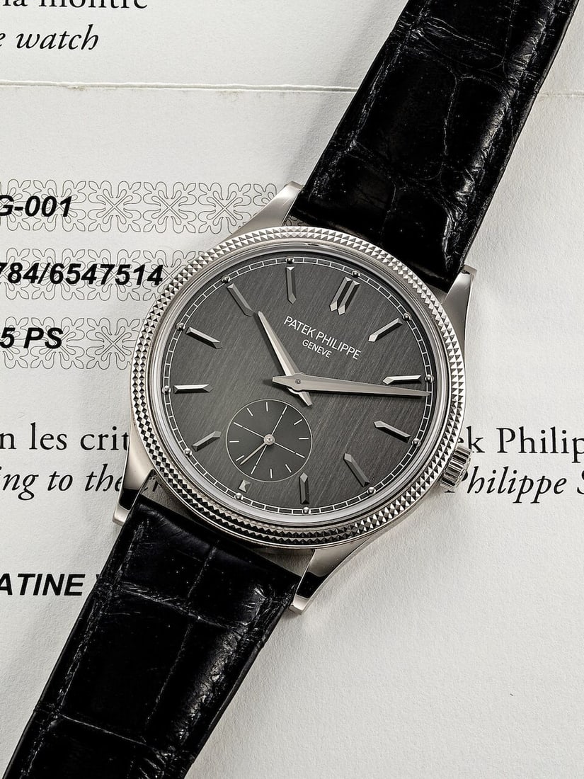 PATEK PHILIPPE | CALATRAVA, REF.6119G-001, A FINE WHITE GOLD WRISTWATCH, CIRCA 2022: PATEK PHILIPPE | CALATRAVA, REF.6119G-001, A FINE WHITE GOLD WRISTWATCH, CIRCA 2022 Calibre: 30-255 PS, manual winding, signed Dial: Charcoal grey, signed Case: 39mm, 18k white gold, transparent case