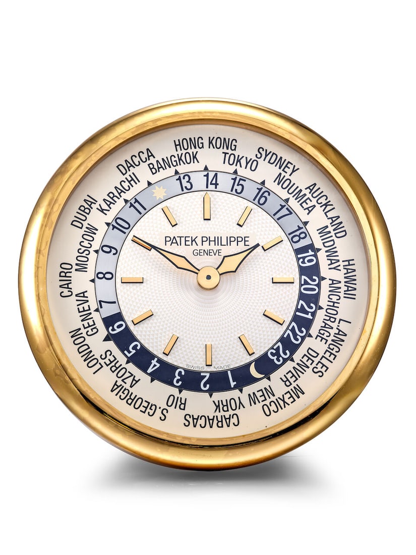 PATEK PHILIPPE | WORLD TIME, A RARE GILT BRASS WALL CLOCK WITH WORLD TIME DIAL, CIRCA 2000 (1 of 4)