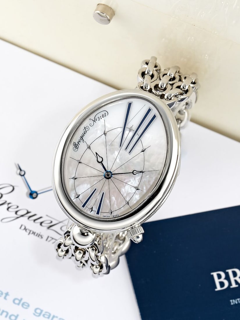 BREGUET | REINE DE NAPLES, REF.8967ST, A NEW OLD STOCK STAINLESS STEEL BRACELET WATCH WITH MOTHE... (1 of 4)