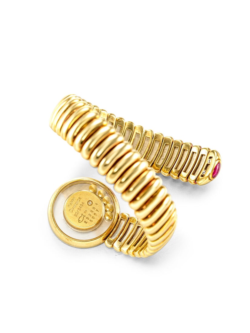 CHOPARD | HAPPY DIAMOND SNAKE, REF.20/5434, A RARE YELLOW GOLD, DIAMOND AND RUBY-SET SPIRAL BANG... - 2