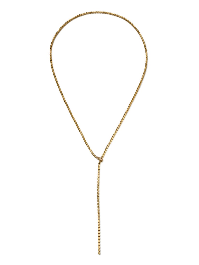 PIAGET: GOLD AND DIAMOND 'POSSESSION' LARIAT NECKLACE: PIAGET: GOLD AND DIAMOND 'POSSESSION' LARIAT NECKLACE 伯爵：黃金配鑽石「Possession」項鍊 Signature: Piaget, no. D23825, maker's