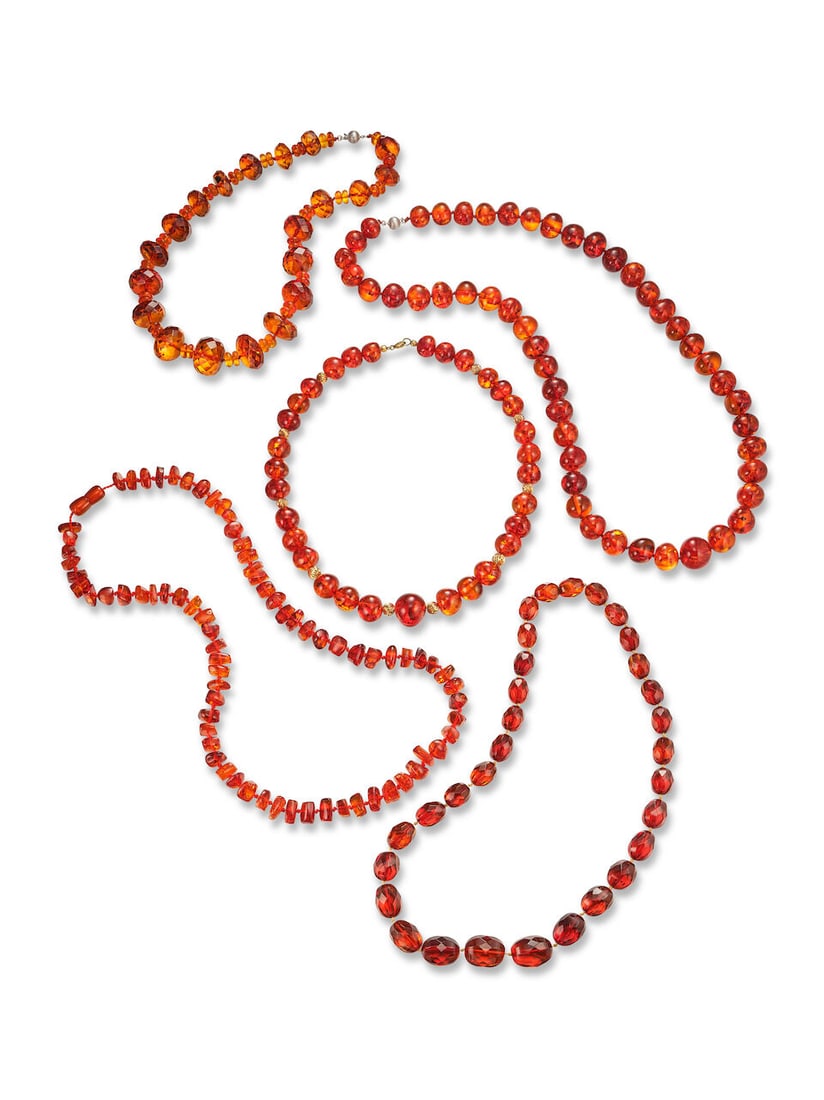GROUP OF AMBER BEAD NECKLACES (5): GROUP OF AMBER BEAD NECKLACES 琥珀串珠項鍊五條 Certificate: Bellerophon, selected amber, natural, orange, heated (B64048, 19 September 2025) Metal: 12