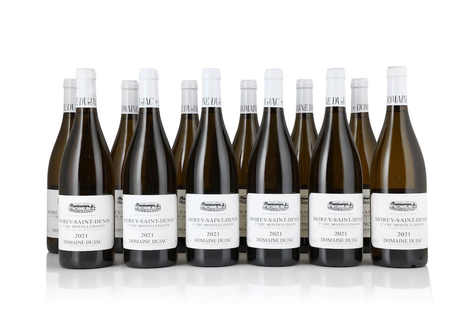 Domaine Dujac, Morey-Saint-Denis Blanc 1er Cru Monts Luisants, 2021 (12 x 750ml): Domaine Dujac, Morey-Saint-Denis Blanc 1er Cru Monts Luisants, 2021 (12 x 750ml) Region: Côte de Nuits Label: 5 lightly bin-soiled Packaging: 2 lightly damp-affected original cartons For further