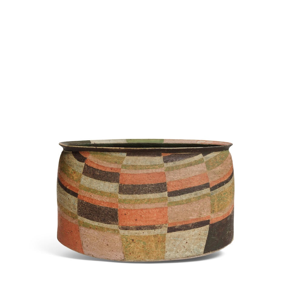 Elizabeth Fritsch (British, born 1940) Early pot, circa 1975: Elizabeth Fritsch (British, born 1940) Early pot, circa 1975 Hand-built stoneware, polychrome slips with curvilinear geometric decoration over an ovoid body with a flared rim. 10.7 cm high, 17 cm wide