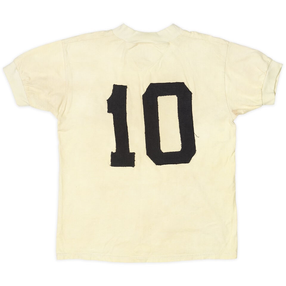 Pelé no. 10 Santos FC shirt 1970-73: Pelé no. 10 Santos FC shirt 1970-73 Game-worn shirt circa 1970-73 White short sleeve Santos Football Club shirt, manufactured by Athleta, knit with club badge on the front and black no. 10 on rev