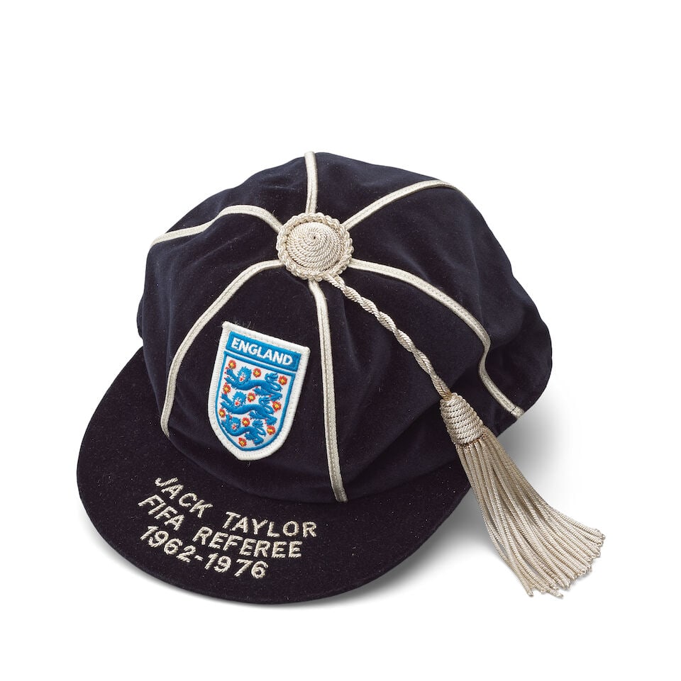 Jack Taylor FIFA England Cap, International Medals and Awards: Jack Taylor FIFA England Cap, International Medals and Awards The FIFA England cap awarded to Jack Taylor for his services to international football Dark blue velvet with silver-coloured braided cord 
