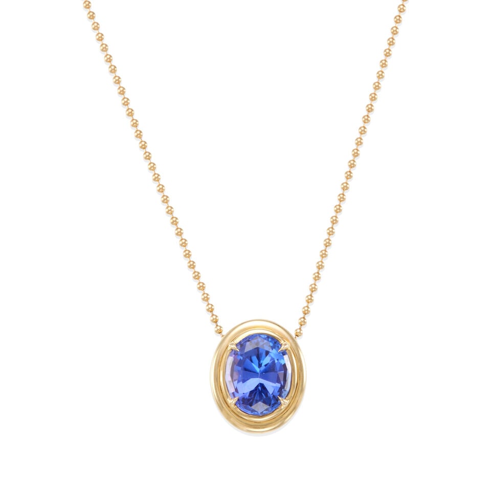 14K GOLD AND TANZANITE NECKLACE: 14K GOLD AND TANZANITE NECKLACE • 14k yellow gold • 1 oval tanzanite weighing approximately 4.85 - 4.95 carats total • Length 18 1/4 in. • Estimated gross weight: 7.0