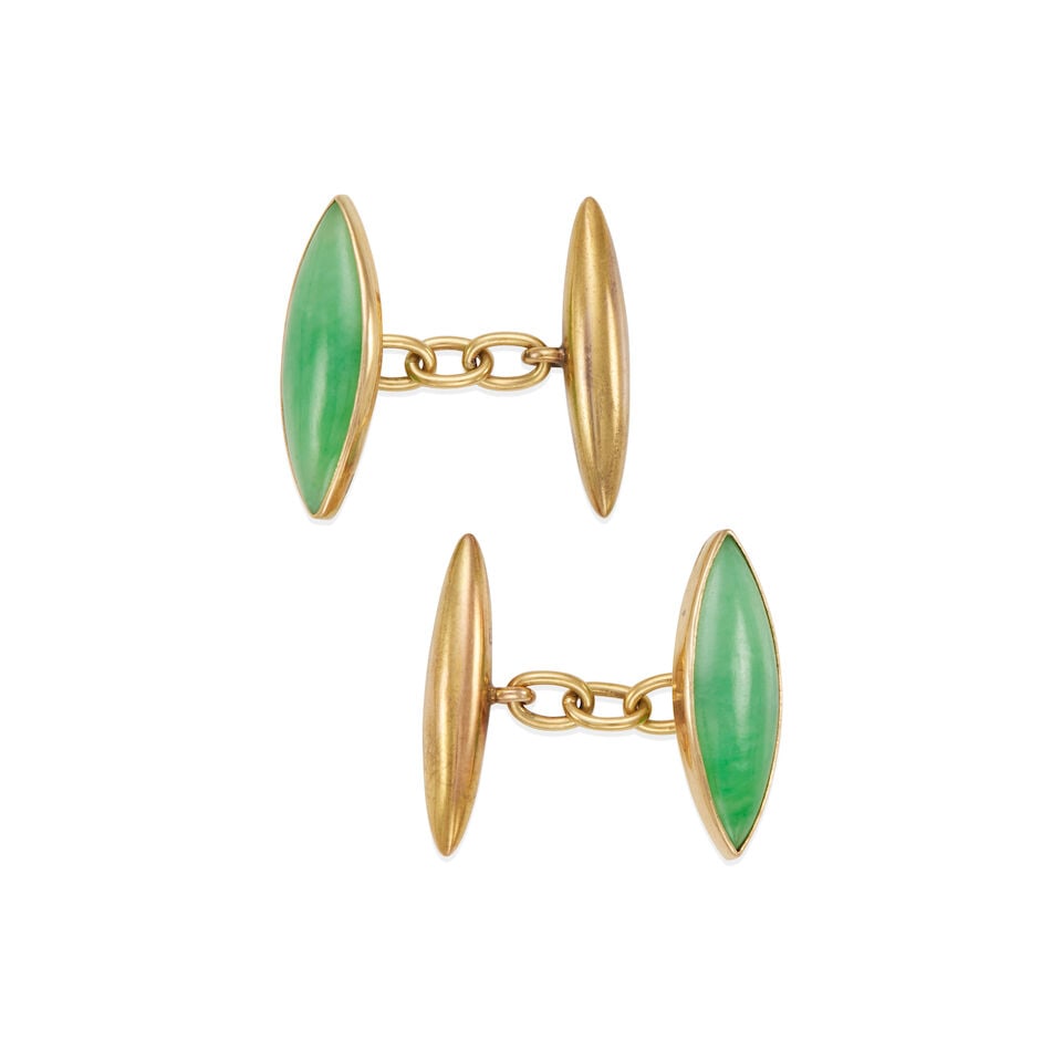 PAIR OF 15K GOLD AND JADE CUFFLINKS: PAIR OF 15K GOLD AND JADE CUFFLINKS • 15k yellow gold • 2 marquise cabochon jades measuring 23.25 x 8.10 x 3.10 mm and 23.20 x 8.18 x 3.10 mm each in diameter • Length: 7/8