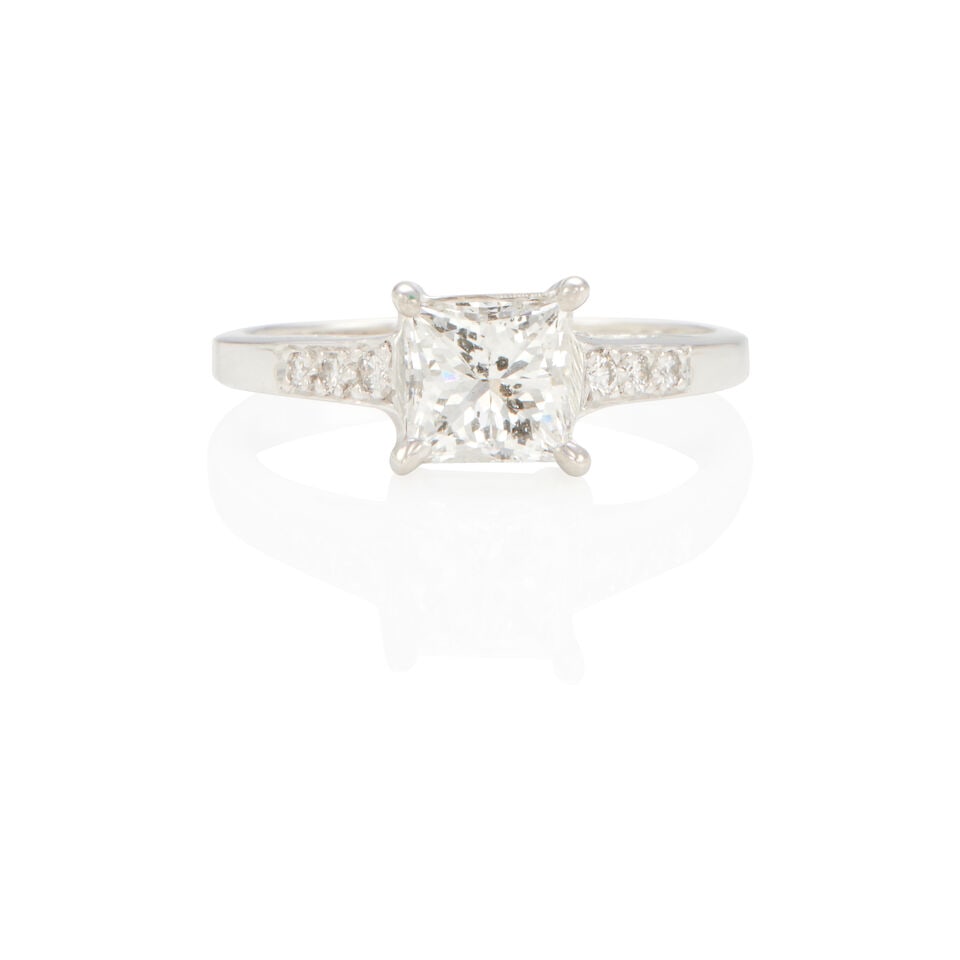 14K GOLD AND DIAMOND RING: 14K GOLD AND DIAMOND RING • 14k white gold • 1 square diamond weighing approximately 1.05 - 1.25 carat • 6 round diamonds weighing approximately 0.03 - 0.07 carat total •
