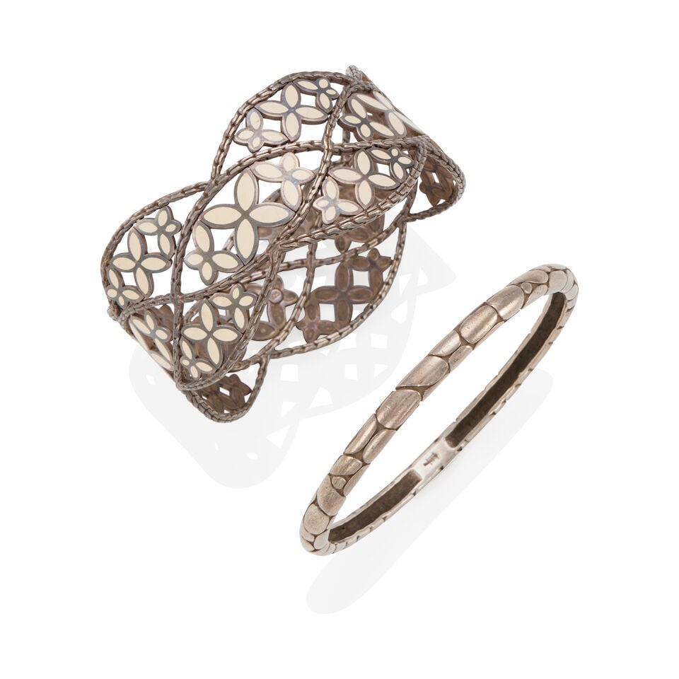 TWO STERLING SILVER AND ENAMEL BRACELETS: TWO STERLING SILVER AND ENAMEL BRACELETS • JOHN HARDY: Sterling silver and enamel endless bangle bracelet, length 7 ½ in • Sterling silver endless bangle bracelet with incised