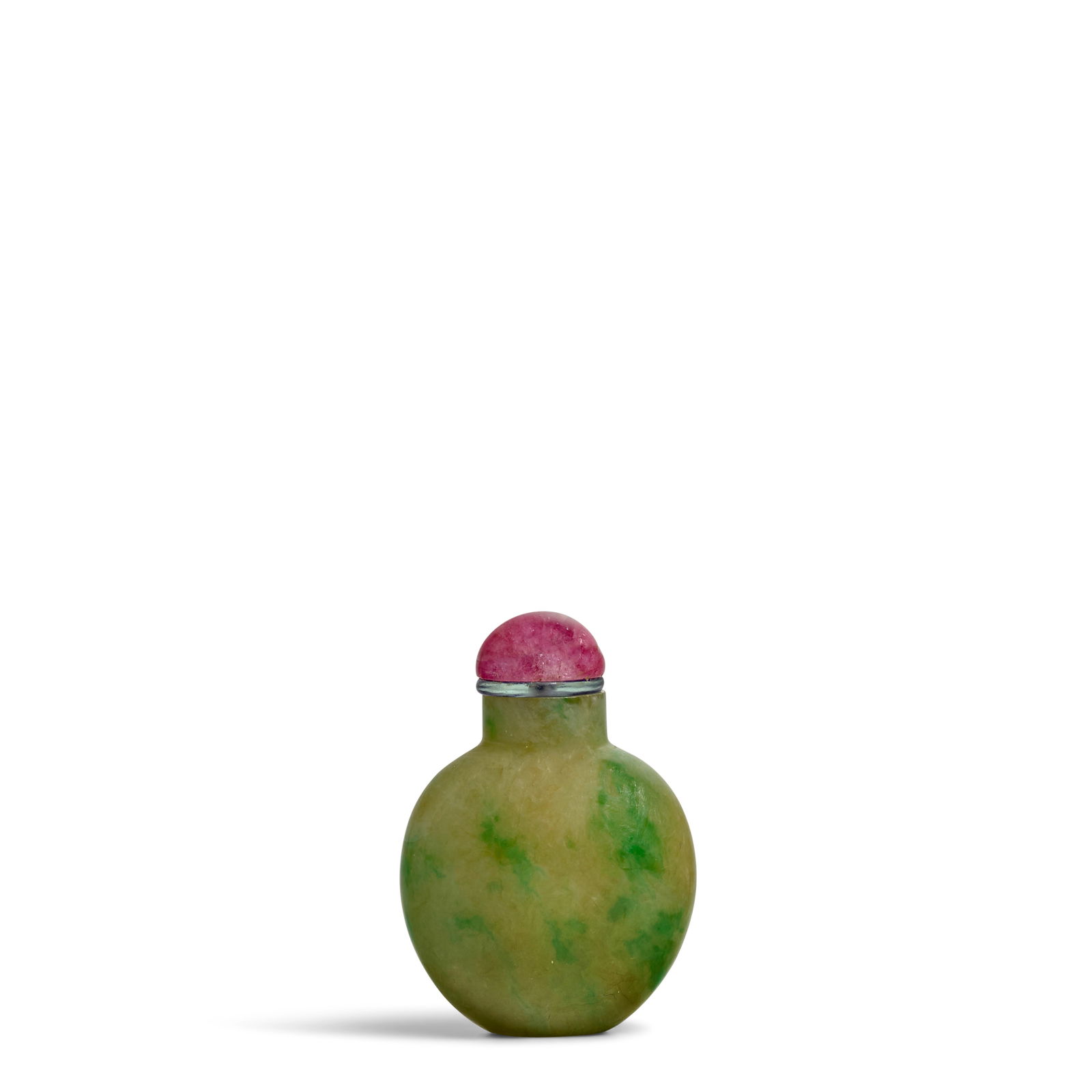 AN APPLE-GREEN-FLECKED JADEITE SNUFF BOTTLE 1800-1850: AN APPLE-GREEN-FLECKED JADEITE SNUFF BOTTLE 1800-1850 Of flattened spade shape, under a cylindrical neck with flat rim and a slightly wider mouth, supported on an oval flat base, the jadeite of celado