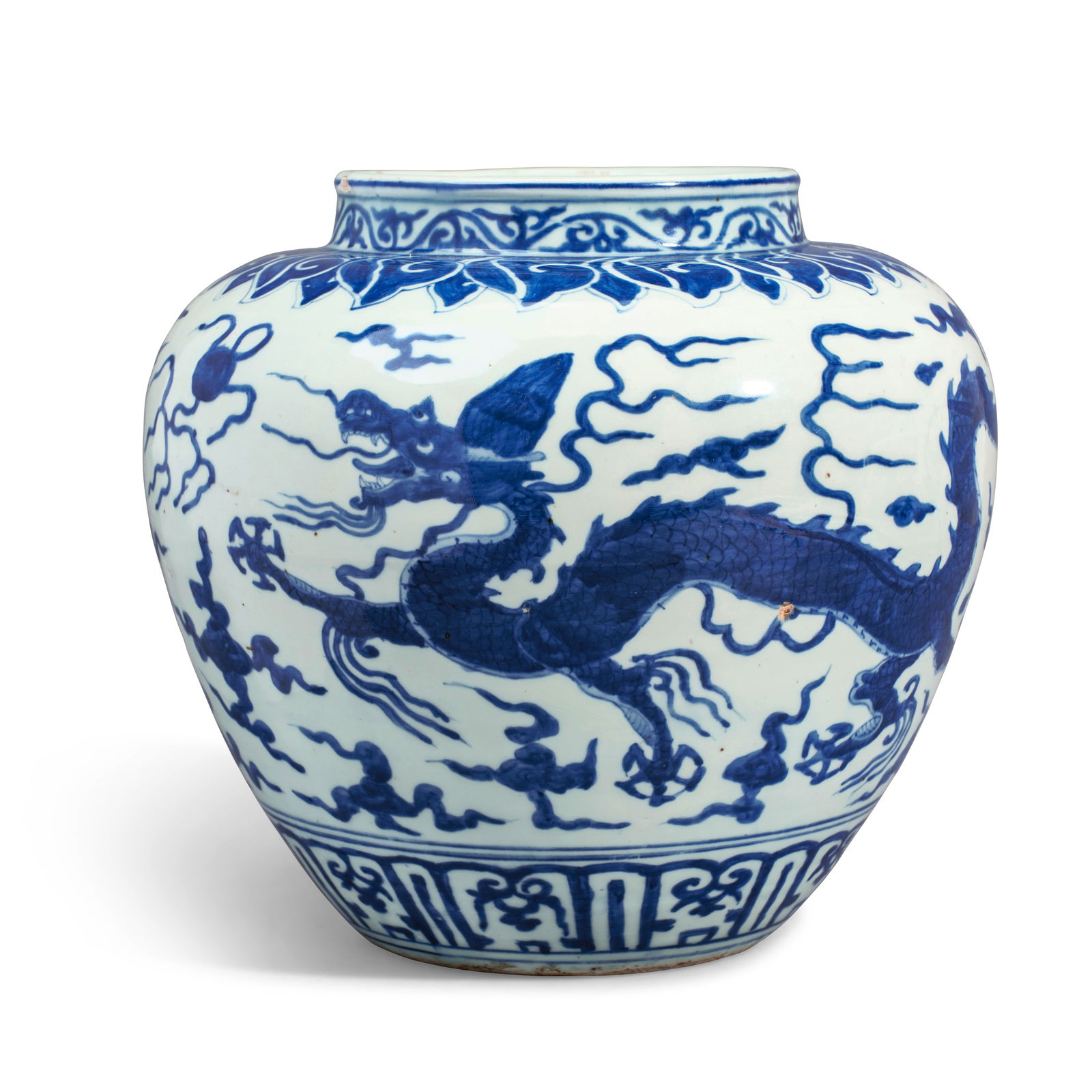 A BLUE AND WHITE 'DRAGON' JAR Jiajing six-character mark within double circle and of the period ...: A BLUE AND WHITE 'DRAGON' JAR Jiajing six-character mark within double circle and of the period Painted in vibrant tones of cobalt blue, the robustly potted vessel painted with two five-claw dragons,