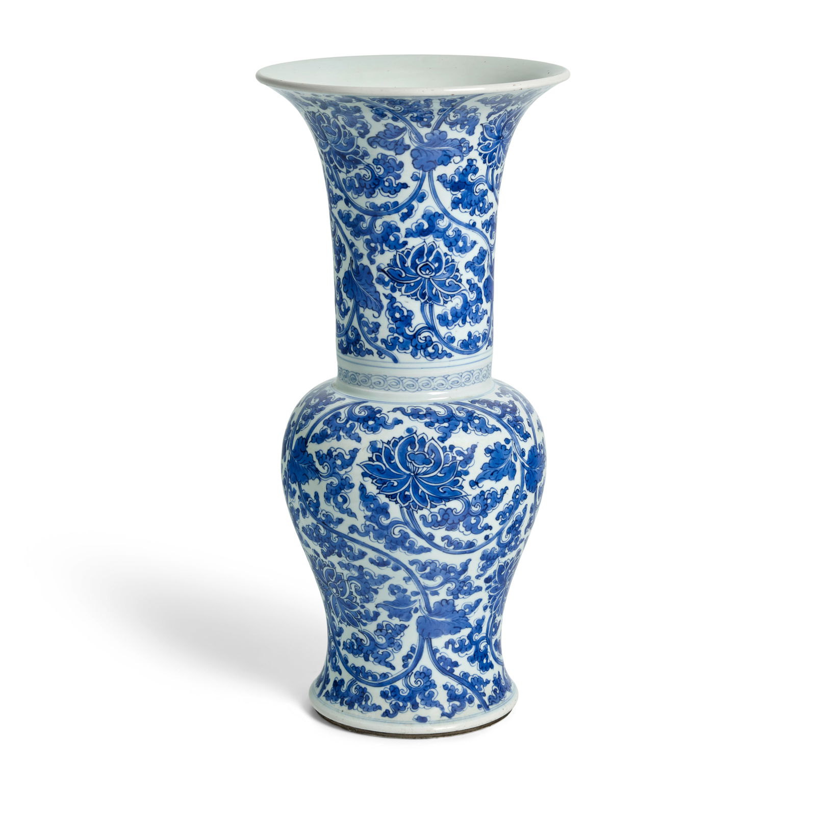 A BLUE AND WHITE 'LOTUS' YEN YEN VASE Kangxi: A BLUE AND WHITE 'LOTUS' YEN YEN VASE Kangxi Painted in vibrant shades of blue, the large flowerheads neatly arranged in four rows and encircled by dense leafy tendrils, a band of small concentric cir