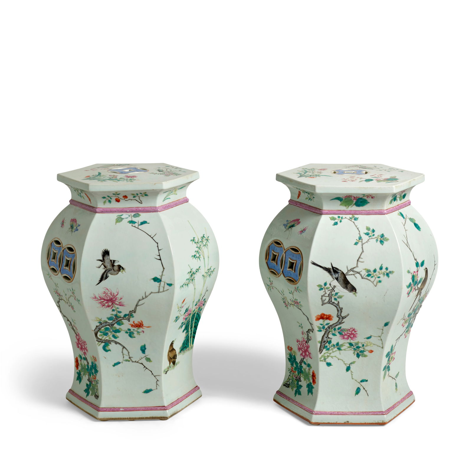 A PAIR OF FAMILLE ROSE HEXAGONAL TOP PORCELAIN STOOLS Jiaqing/Daoguang (2): A PAIR OF FAMILLE ROSE HEXAGONAL TOP PORCELAIN STOOLS Jiaqing/Daoguang Each of hexagonal baluster form, decorated in famille rose enamels with white-breasted black birds in flight, perched on fruit tr