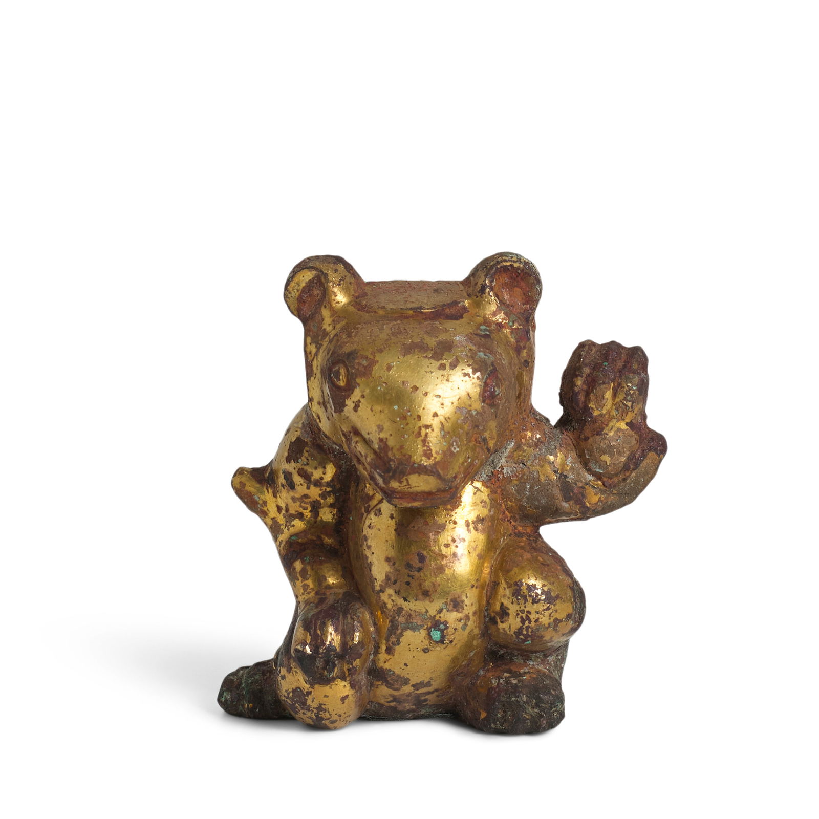 A GILT BRONZE BEAR-FORM SUPPORT Han Dynasty (fitted stand): A GILT BRONZE BEAR-FORM SUPPORT Han Dynasty Cast in the round as a foot of a vessel, the beast squatting low with its right paw pressed onto the tugged knee and left paw raised, the back open from the