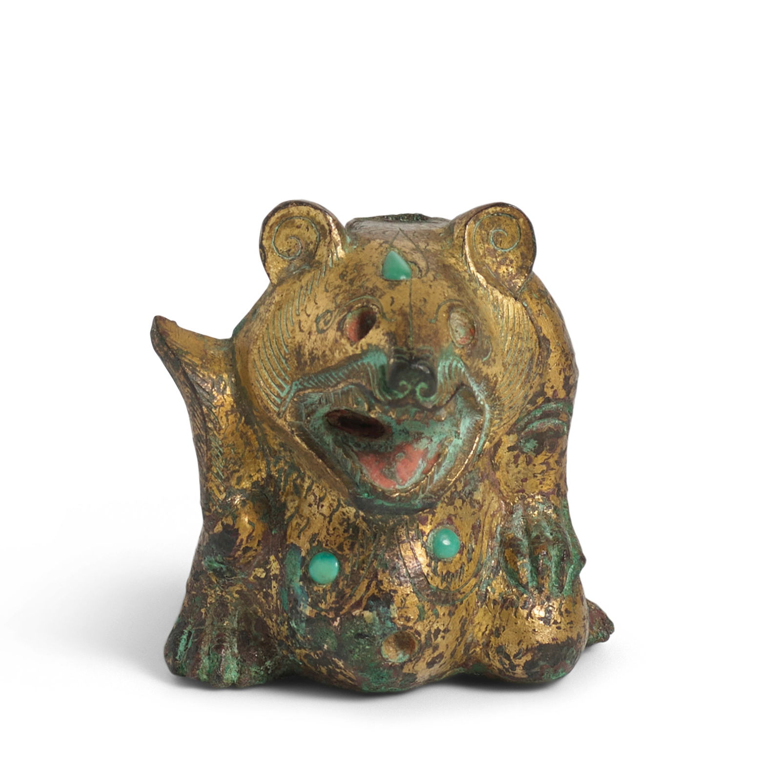A SMALL INLAID GILT BRONZE BEAR-FORM SUPPORT Han Dynasty: A SMALL INLAID GILT BRONZE BEAR-FORM SUPPORT Han Dynasty Cast hollow and in the round, the beast squatting low in a ferocious expression, its left paw resting on the thigh with its left leg tugged und
