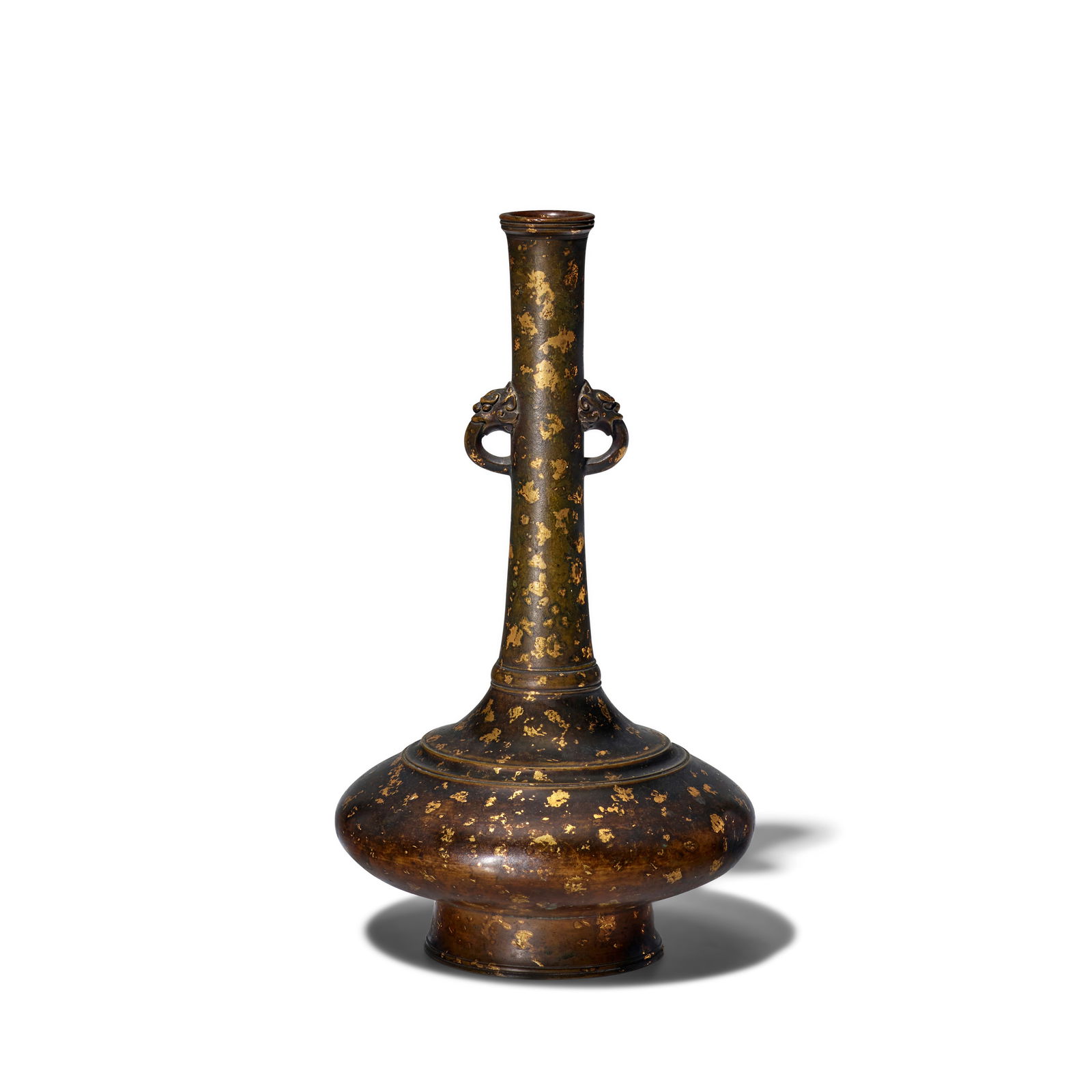 A BRONZE GOLD-SPLASHED BOTTLE VASE Xuande four-character mark, 17th/18th century: A BRONZE GOLD-SPLASHED BOTTLE VASE Xuande four-character mark, 17th/18th century Cast in the compressed pear shape with a slightly tapering cylindrical tall neck, flanked at mid-point with a pair of a