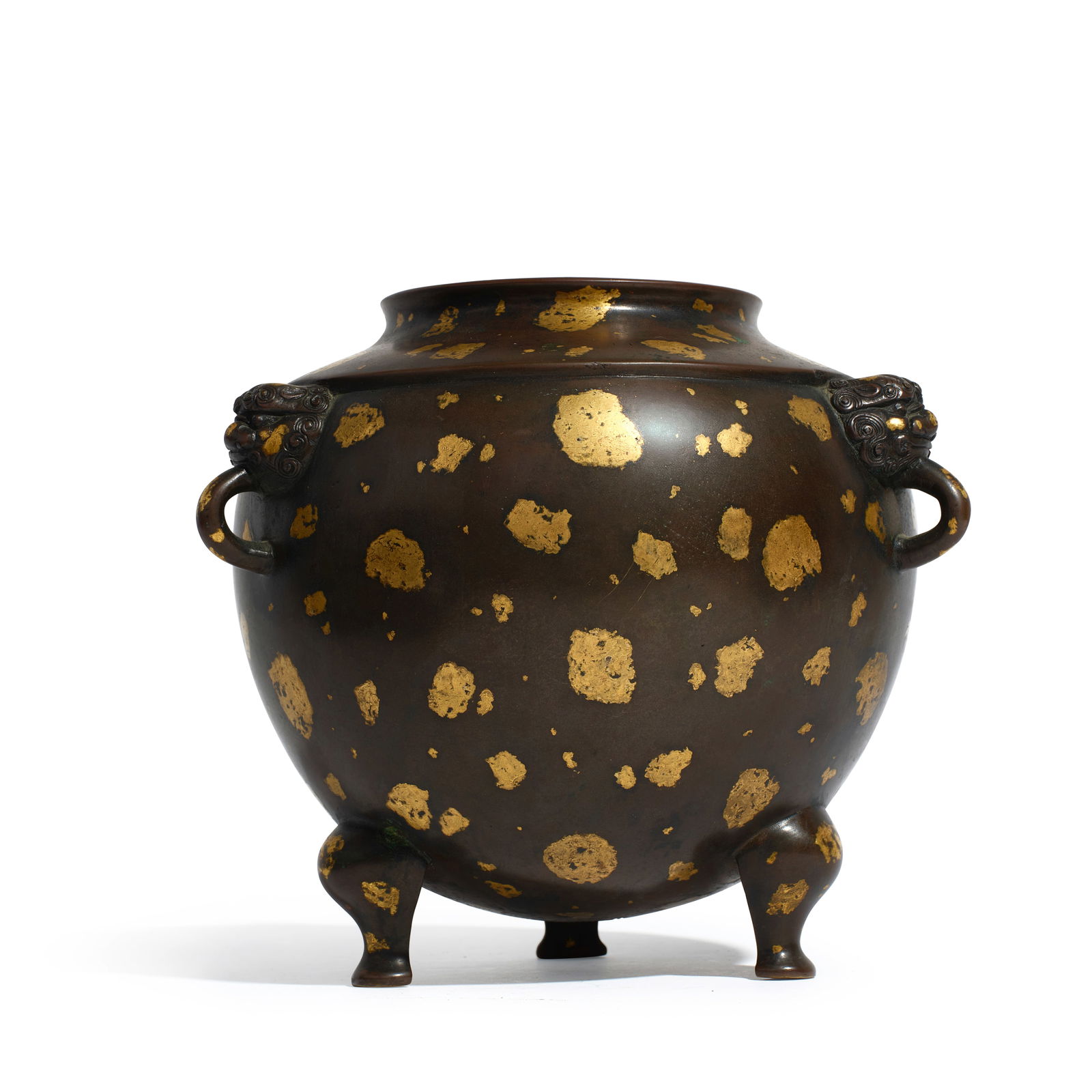 A GOLD-SPLASHED BRONZE TRIPOD GLOBULAR CENSER 18th century (brocade box): A GOLD-SPLASHED BRONZE TRIPOD GLOBULAR CENSER 18th century Of ovoid shape, the censer heavily casted on three bulbous legs, with three handles issuing from monster masks, right below a stepped shoulde