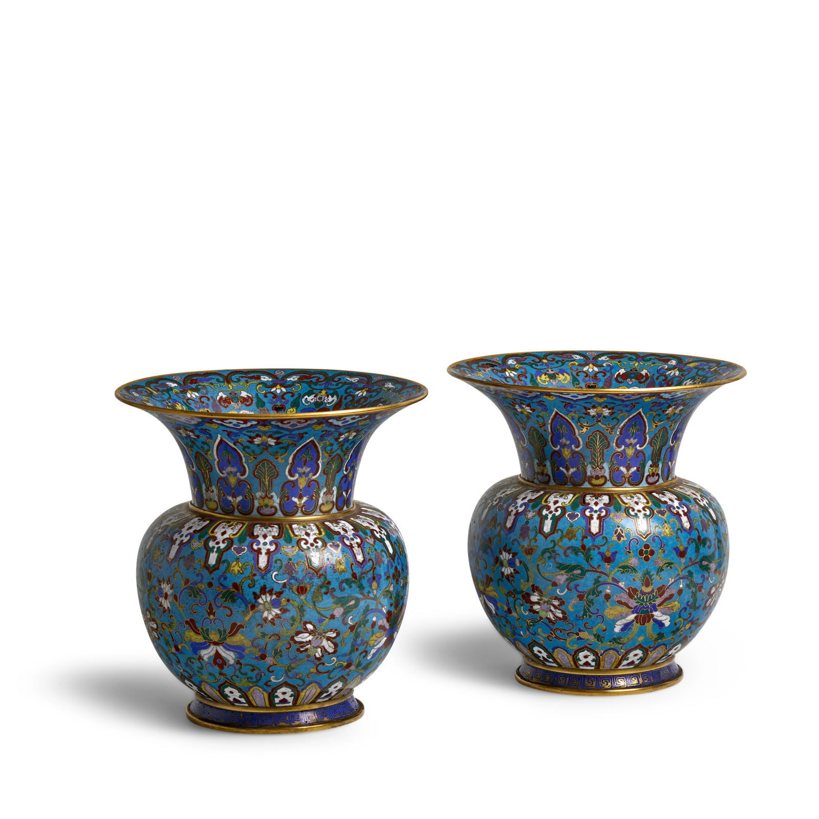 A PAIR OF CLOISONNÉ ENAMEL SPITTOON-FORM VASES 18th/19th century (2): A PAIR OF CLOISONNÉ ENAMEL SPITTOON-FORM VASES 18th/19th century Each with a high-shouldered spherical body surmounting a trumpet neck and supported by a short splayed foot, decorated with a frie