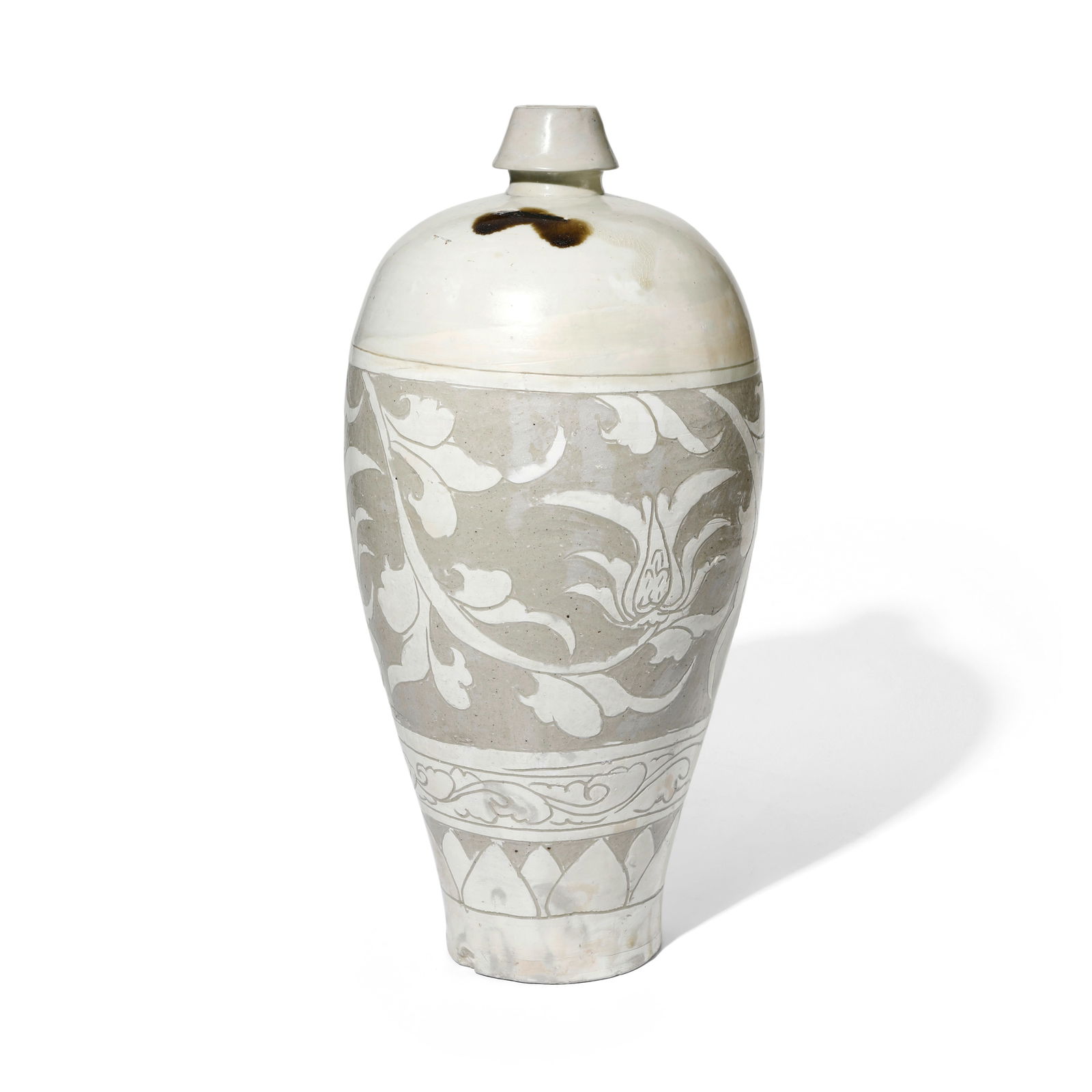 A CIZHOU SGRAFFIATO 'FLORAL-SCROLL' VASE, MEIPING Jin/Yuan Dynasty: A CIZHOU SGRAFFIATO 'FLORAL-SCROLL' VASE, MEIPING Jin/Yuan Dynasty The tall tapered vessel with broad, rounded shoulders and an unglazed recessed foot, surmounted by a short neck with flaring, sloped