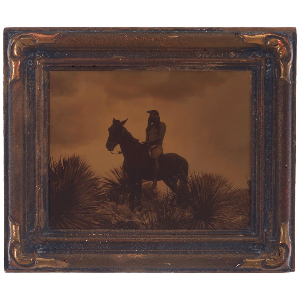 An Edward S. Curtis orotone, 'The Scout - Apache' (1 of 2)