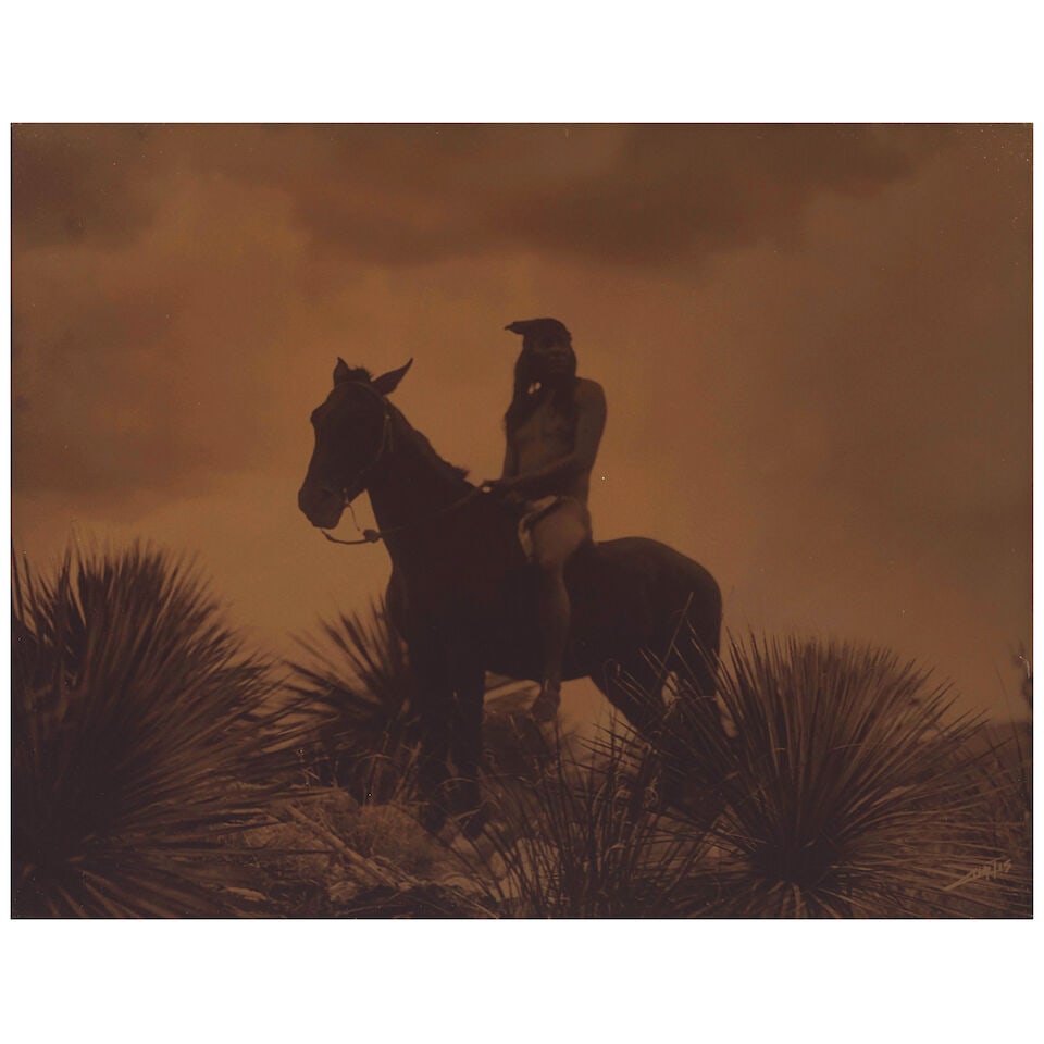 An Edward S. Curtis orotone, 'The Scout - Apache' - 2