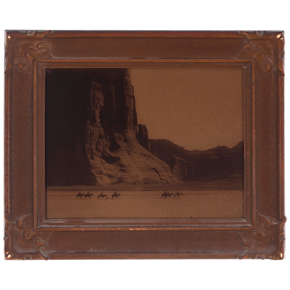 An Edward S. Curtis orotone, 'Canyon de Chelly - Navaho': Edward S. Curtis American, (1868-1952), 'Canyon de Chelly - Navaho,' orotone on glass, framed in original Curtis Studio frame, signed, copyrighted and inscribed: L.A. for the Los Angeles studio in the