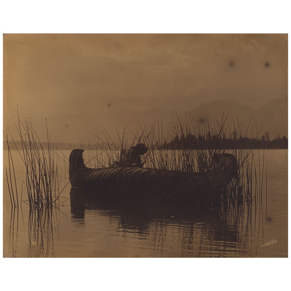 An Edward S. Curtis orotone, 'The Rush Gatherer - Kutenai' - 2