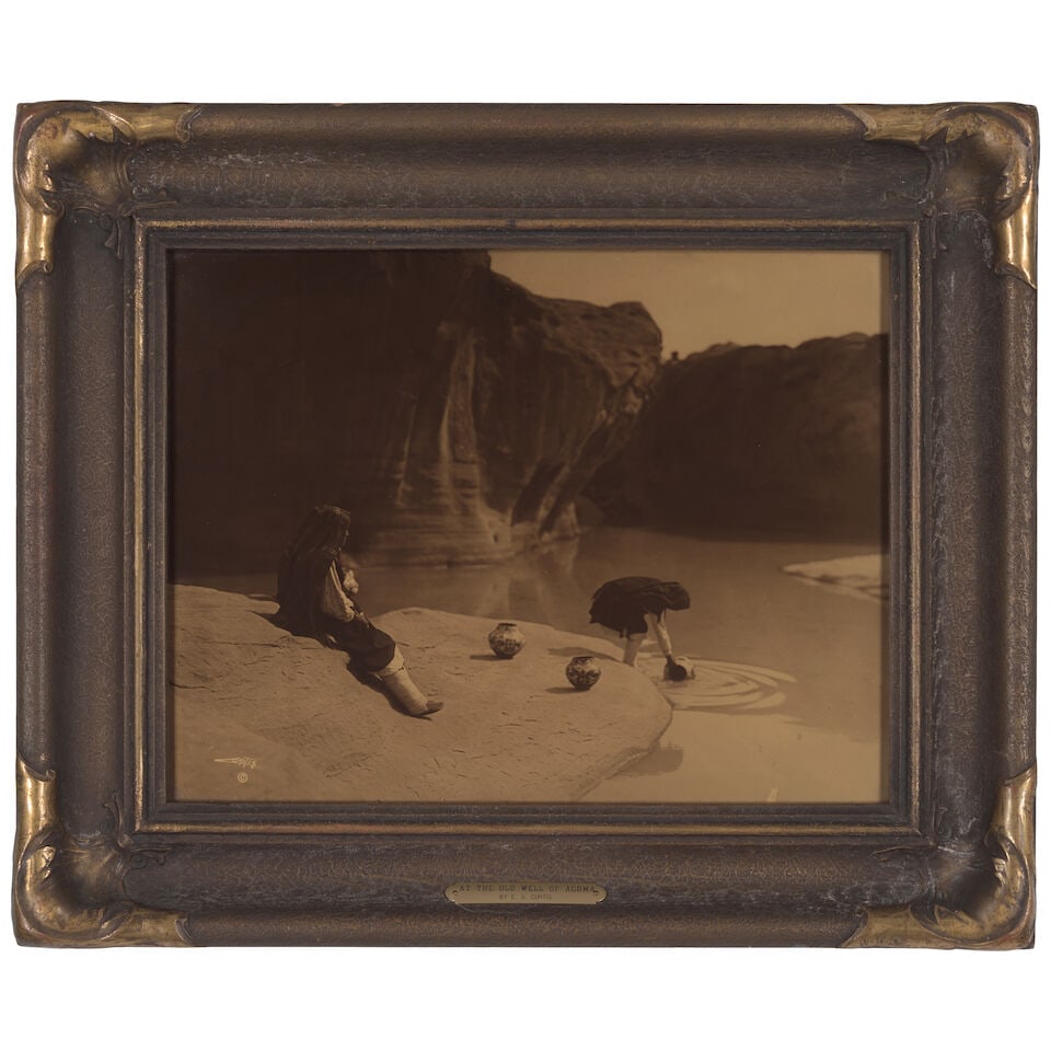 An Edward S. Curtis orotone, 'At the Old Well of Acoma' (1 of 2)