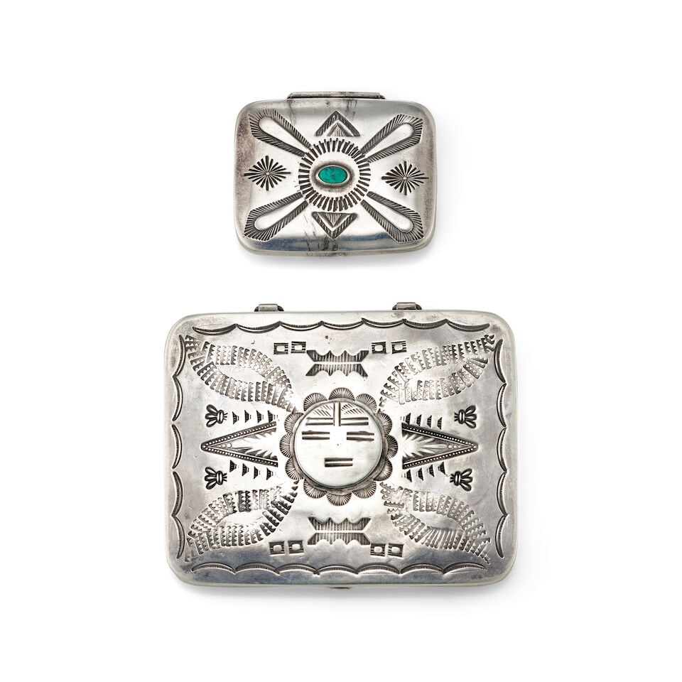 Two Diné (Navajo) or Zuni silver boxes: Two Diné (Navajo) or Zuni silver boxes Each with stamped adornment, the smaller set with a single oval turquoise, unsigned; the larger centering a katsina face, stamped with C.G. Wallace's
