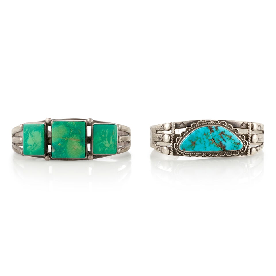 Two Diné (Navajo) cuff bracelets: Two Diné (Navajo) cuff bracelets Each of silver, stamped and pierced, the first centering a single turquoise; the second set with three rectangular turquoise. first: inner circumference