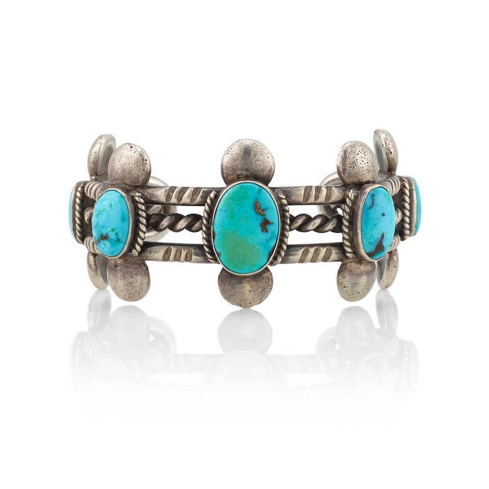 A Juan De Dios attributed silver and turquoise cuff bracelet (1 of 3)