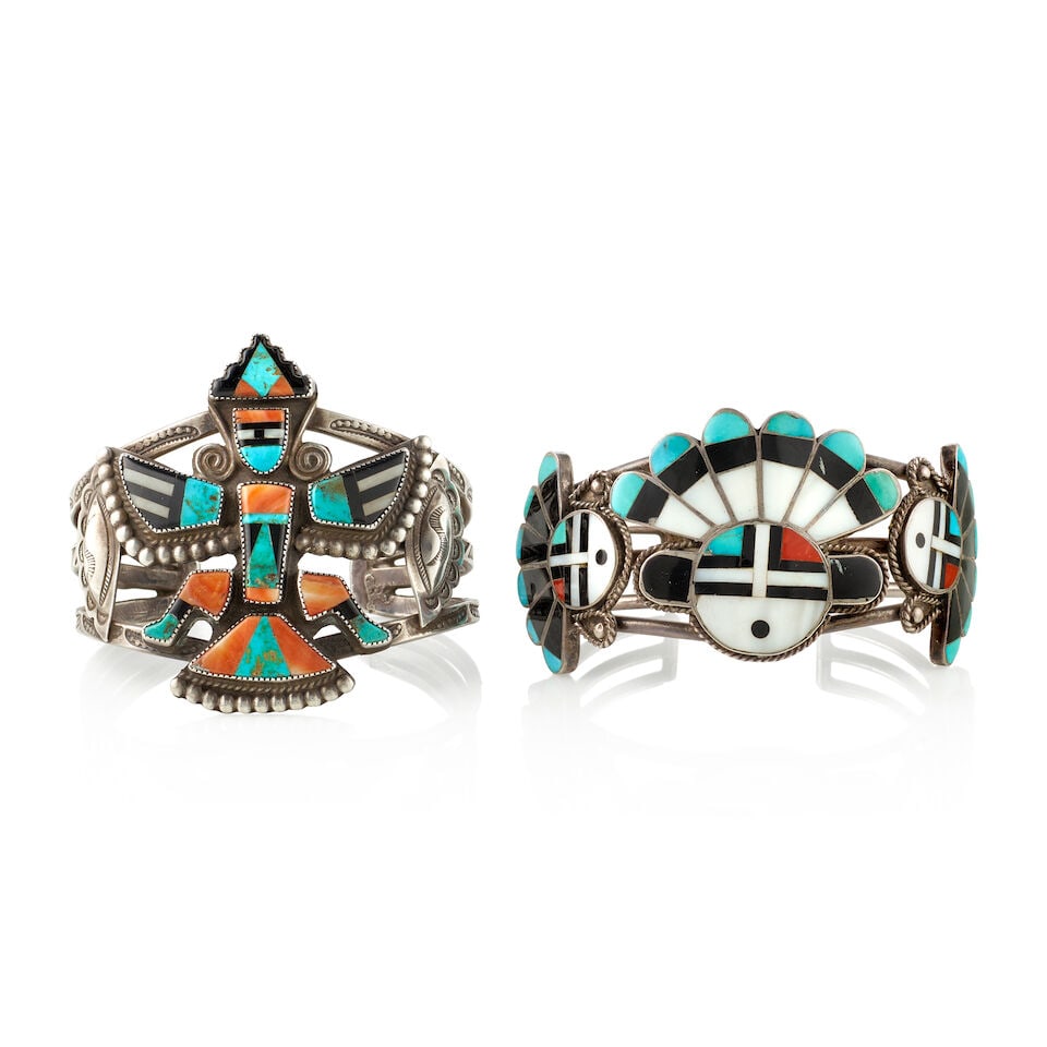 Two Mary Kallestewa multi-stone inlay cuff bracelets: Mary Kallestewa Zuni, (1915-1987), two silver multi-stone inlaid cuff bracelets, the first in a Sunface motif, the second in a Knifewing motif, each apparently unsigned. first: inner circumference (in
