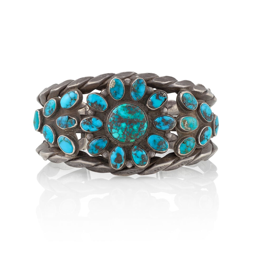 A Zuni silver and turquoise cluster bracelet (1 of 3)