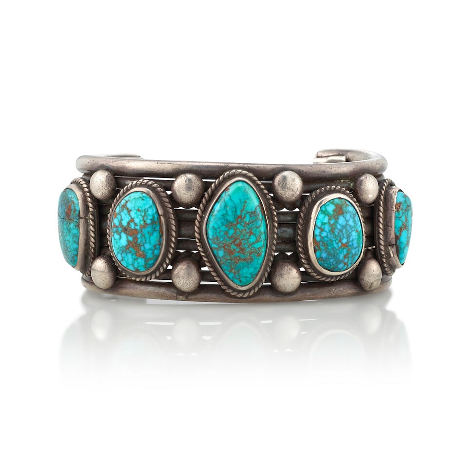 A Diné (Navajo) silver and turquoise cuff bracelet (1 of 3)