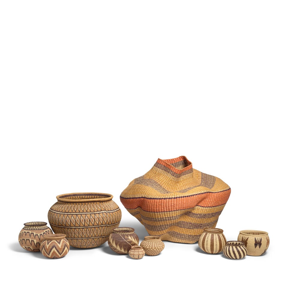 Nine Wounaan baskets and a Bolga example: Nine Wounaan baskets and a Bolga example Panama (Wounaan) and Ghana (Bolga), the nine Panamanian examples in geometric or pictorial patterns, diameter 3 - 15 1/2in; the Bolga of eccentric form,
