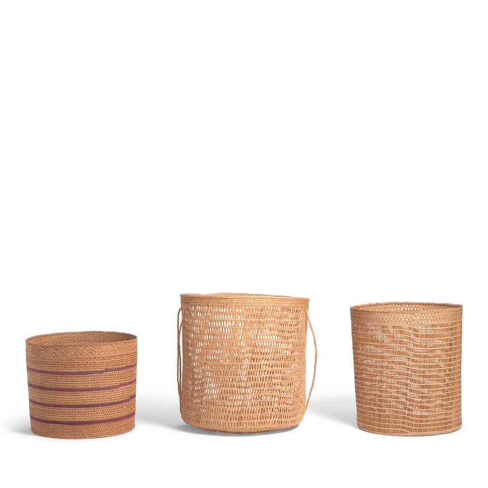 Three contemporary Haida baskets: Three contemporary Haida baskets Each of cylindrical form, including: 'Seaweed Basket,' circa 2002, by Eliasica Timmerman (Haida, b. 1975), titled and signed on the accompanying tag; an openwork