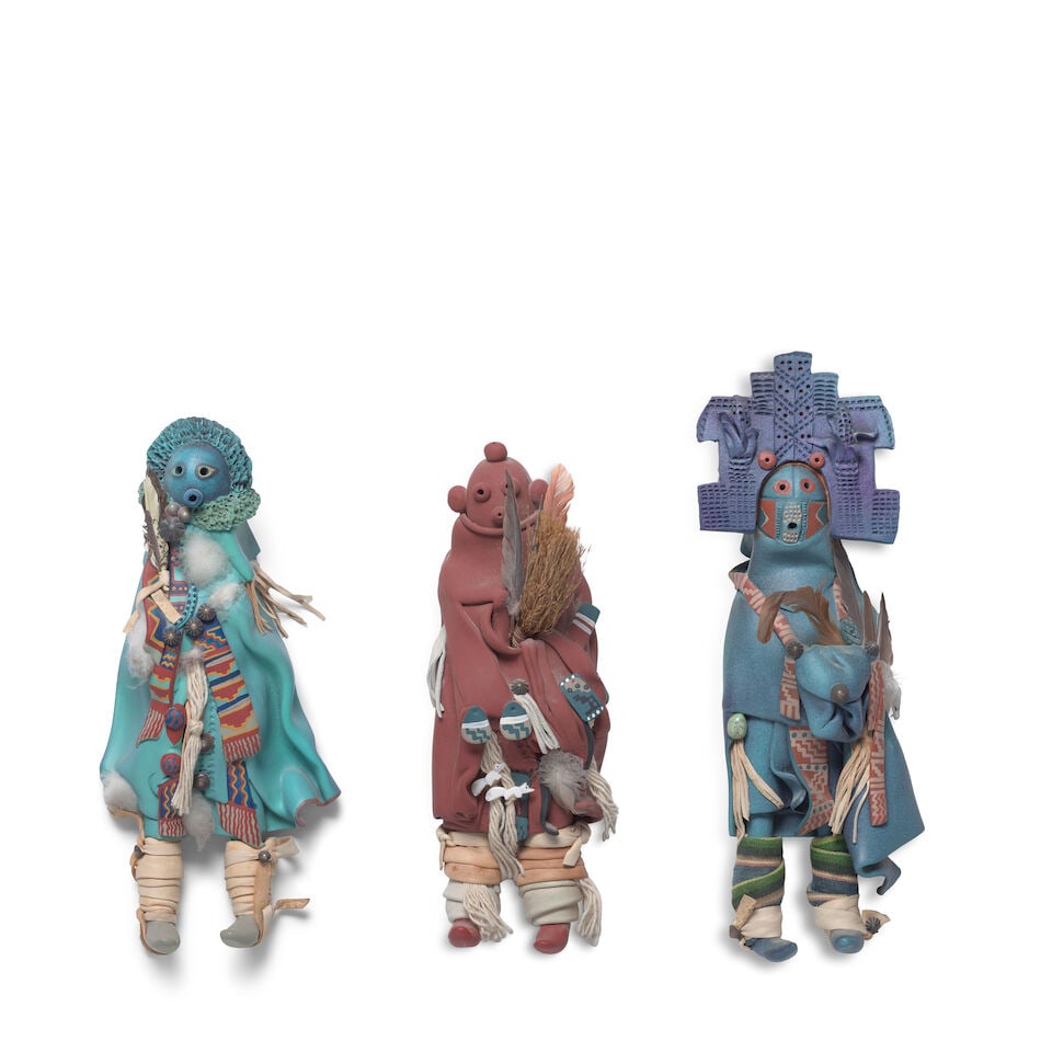 Three Elizabeth Abeyta ceramic sculptures, depicting katsina figures: Elizabeth Abeyta Diné/Navajo, (1955 - 2006), three painted ceramic and mixed media sculptures, each dated 1989 and signed 'Nah-Glee-eh-Bah' at back, depicting a Mudhead and two katsina figures. h