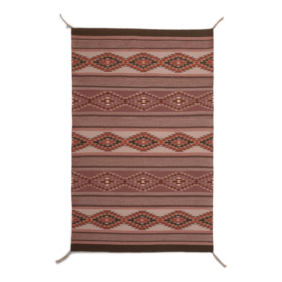 A Modern Diné (Navajo) Wide Ruins rug: A Modern Diné (Navajo) Wide Ruins rug Relatively finely woven in a banded geometric motif, of warm earth-toned sheep's wool. size approximately 4ft 11in x 3ft 1in For further information on this 