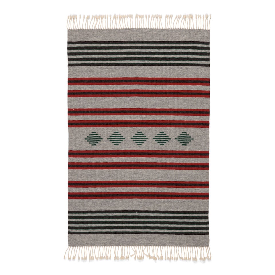 A Ramona Sakiestewa weaving: Ramona Sakiestewa Hopi, (b. 1948), a wool tapestry in a striped motif centering five banded diamonds, fringed at each end. size approximately (not including fringe) 3ft 10in x 2ft 6in For further info