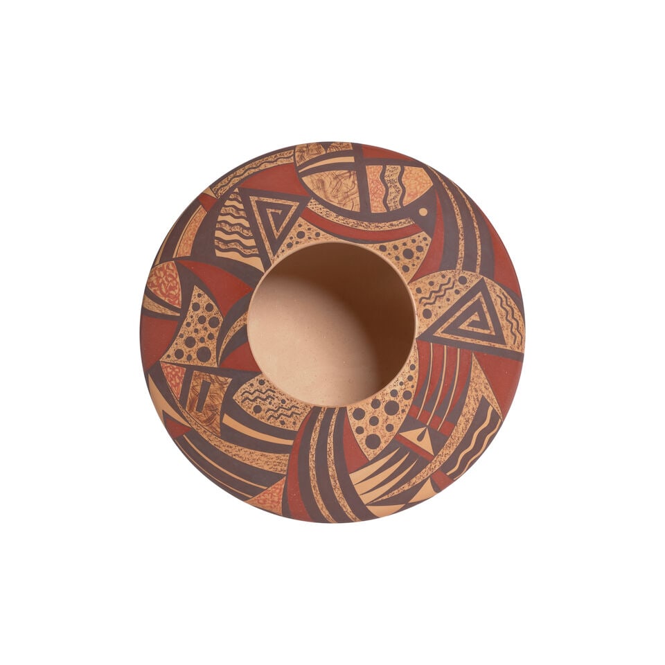 A Steve Lucas polychrome pottery jar: Steve Lucas Hopi, (b. 1955), a polychrome pottery jar, worked in a series of curvilinear and geometric motifs. height 3 3/4in, diameter 9in For further information on this lot please visit