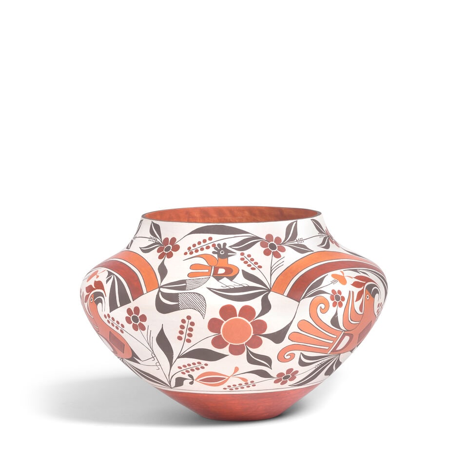 A Joseph Cerno polychrome parrot jar: Joseph Cerno Acoma Pueblo, (b. 1947), a polychrome pottery jar depicting parrots, flowers, and rainbows, signed on the underside: Acoma, New Mexico / Joseph Cerno / 2005. height 7 3/4in, diameter 11