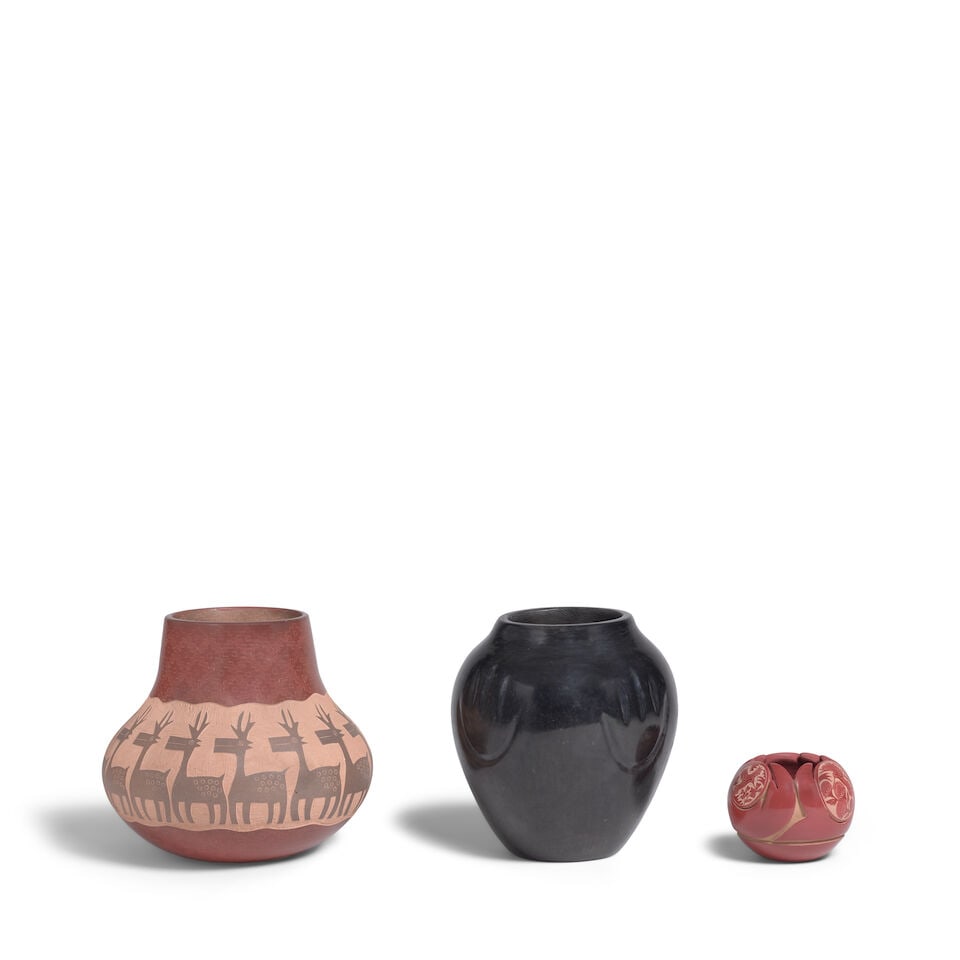 Three modern Santa Clara Pueblo pottery jars: Three modern Santa Clara Pueblo pottery jars Including a sgraffito example by Jody Naranjo (b. 1969), 1999; a blackware bear or badger paw jar, Severa Gutierrez Tafoya, (1890-1973); and a petite sgraf