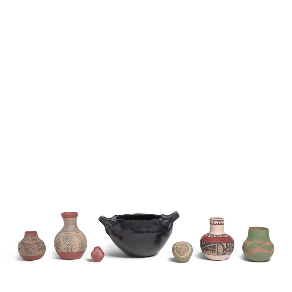 Seven Pueblo pottery jars: Seven Pueblo pottery jars Including a green Avanyu-motif jar by Jennifer Sisneros (Ohkay Owingeh [San Juan], b. 1960), diameter 4in; a Minnie Vigil (Santa Clara, b. 1931) polychrome vase, diameter 4