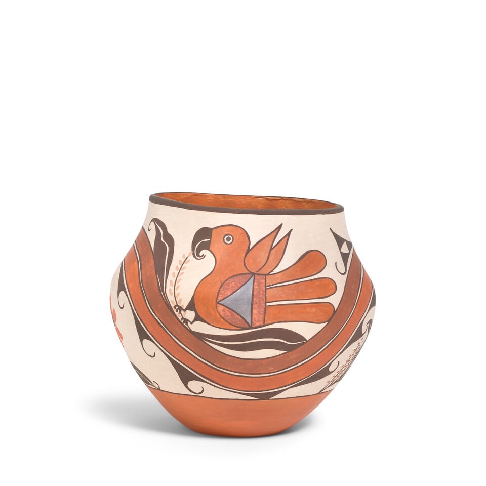 A Marie S. Juanico polychrome parrot jar: Marie S. Juanico Acoma, (b. 1937), a petite four-color parrot jar. height 6in; diameter 6 1/2in For further information on this lot please visit Bonhams.com For further information about this lot